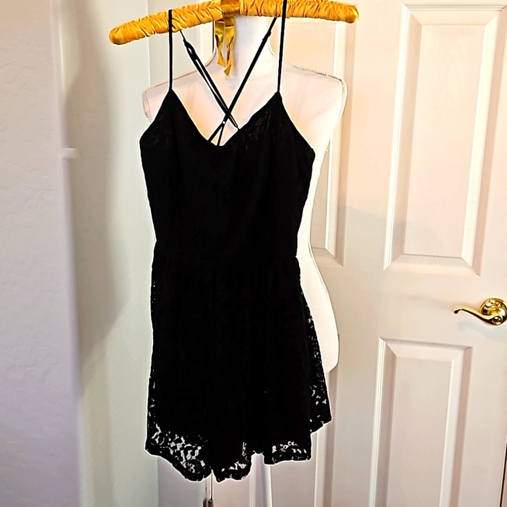 Forever 21 Black lace romper with adjustable straps. Size Medium
